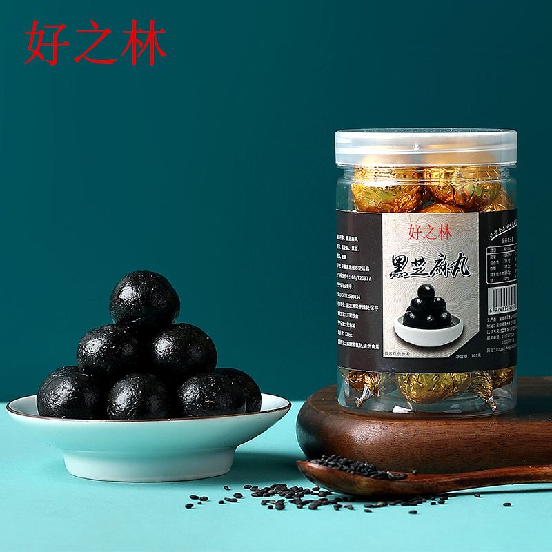 即食批發(fā)蜂蜜黑芝麻丸小零食家黑豆黑米手工丸九蒸九曬網(wǎng)紅零食廠.jpg